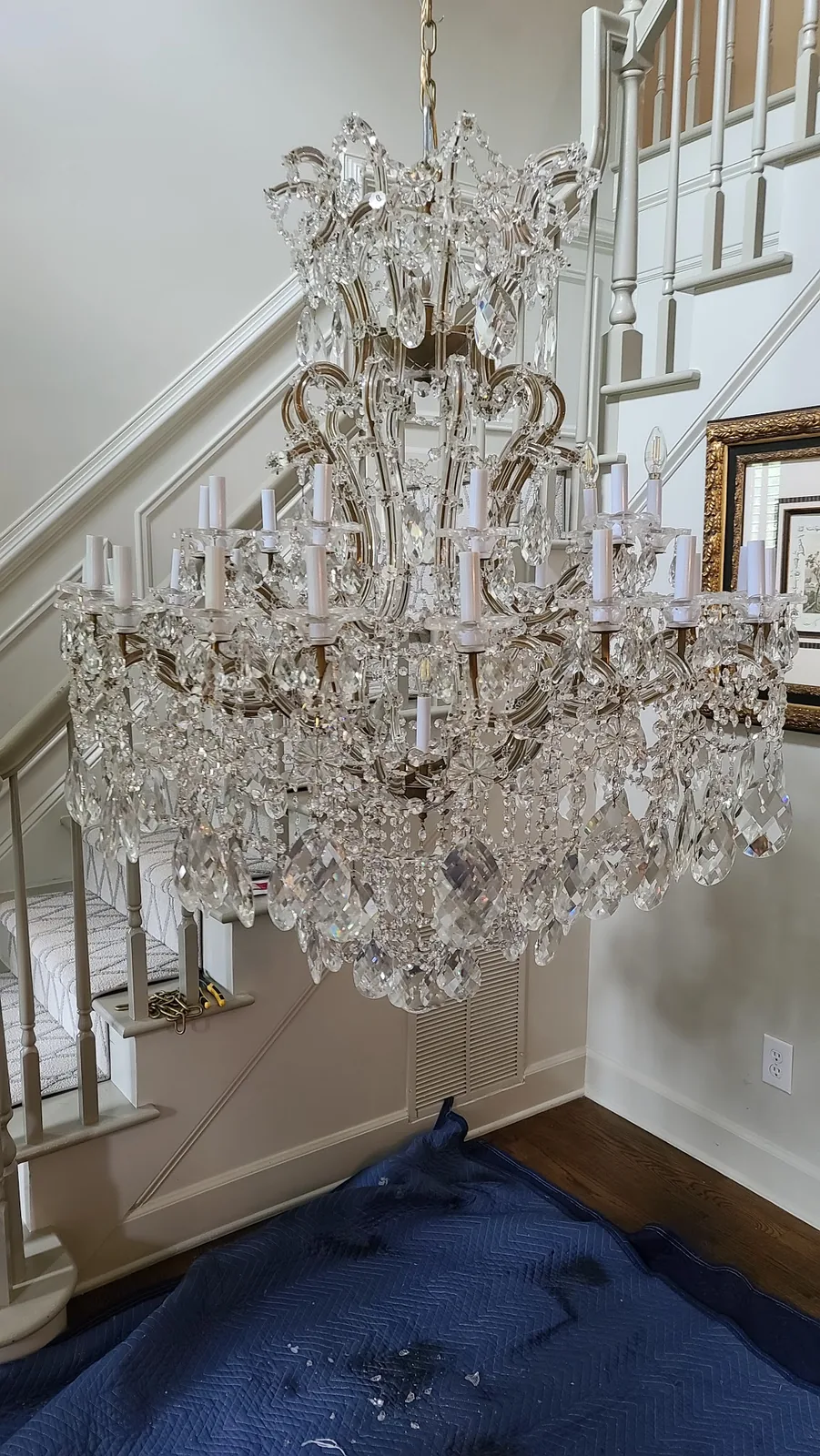 Crystal dining room chandelier installed in an Atlanta home