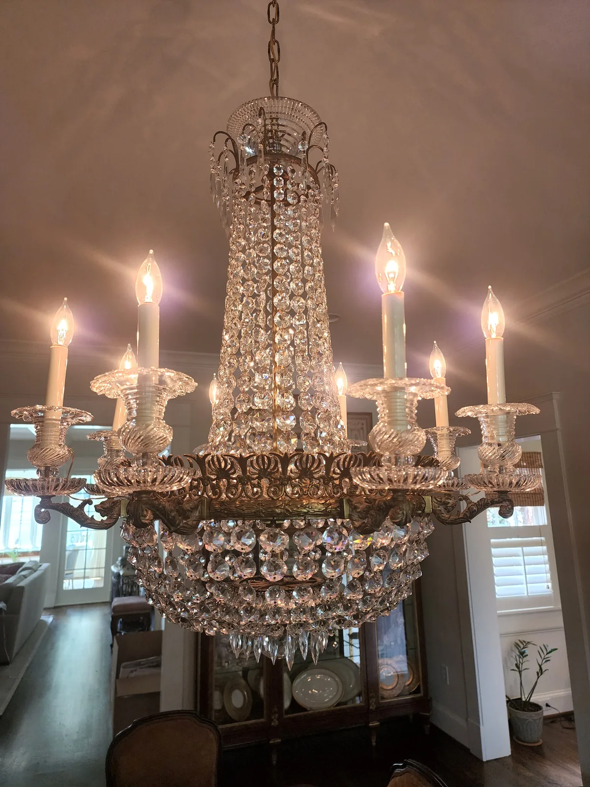 Large crystal chandelier assembly project in an Atlanta home