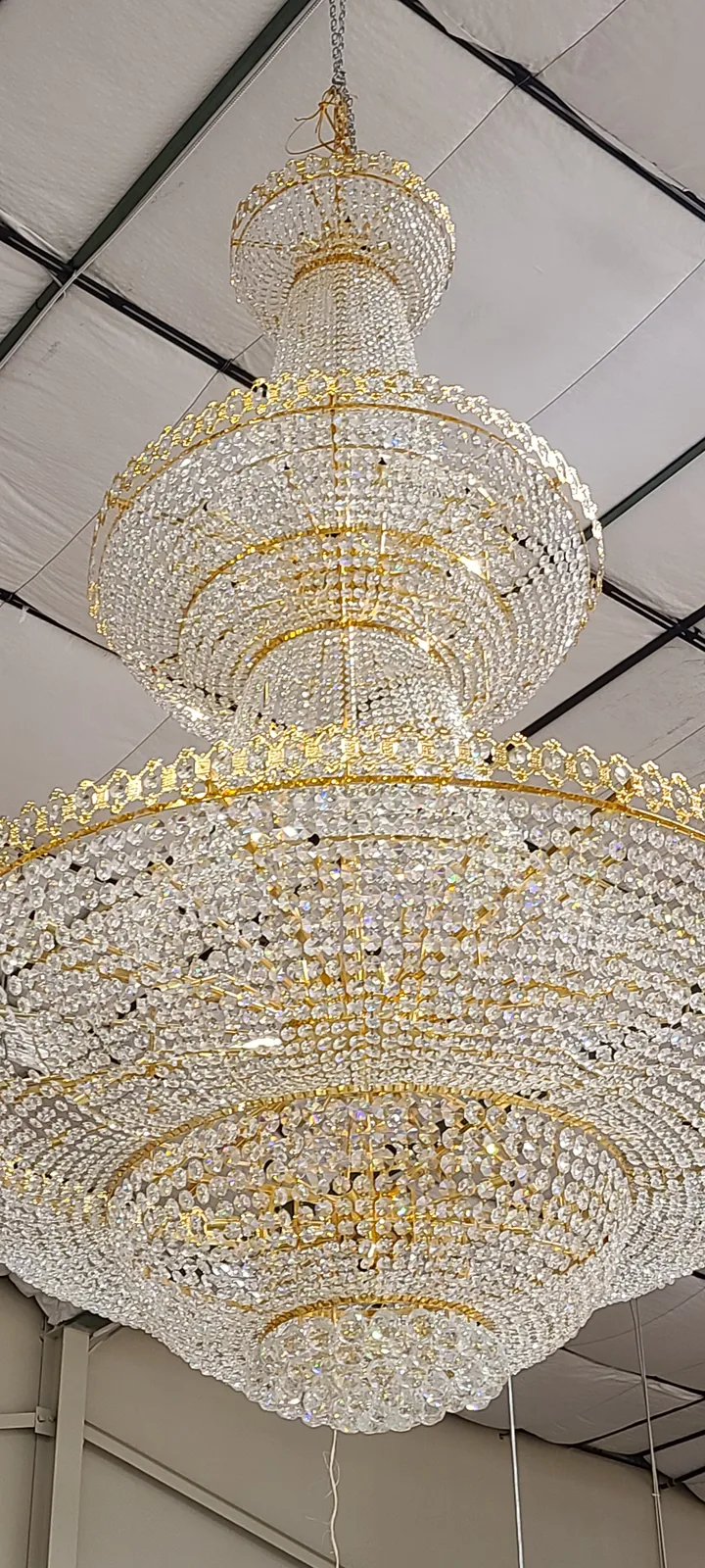 Oversized crystal chandelier installed in an Atlanta home