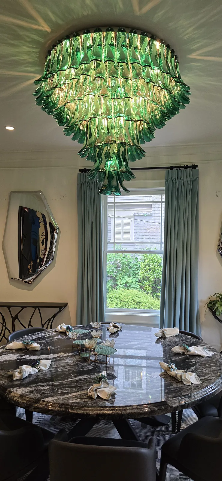 Modern dining room chandelier installed in an Atlanta home