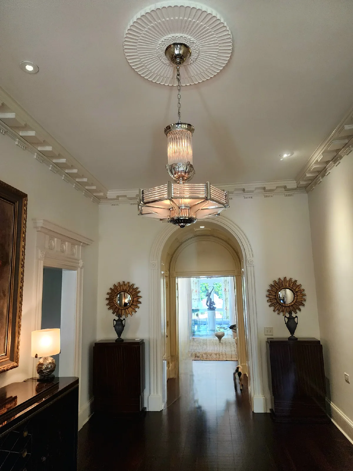 Entryway chandelier installed in a luxury Atlanta home