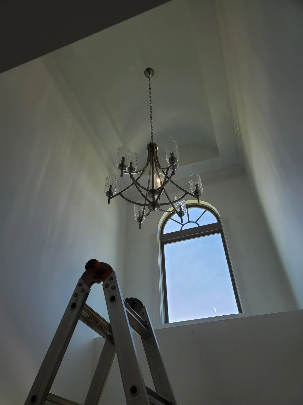Entryway crystal chandelier installed in an Atlanta home