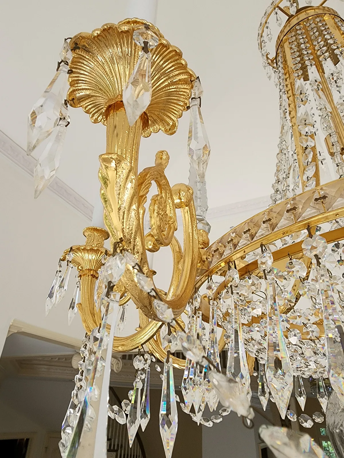 Foyer light fixture and chandelier installed in an Atlanta home