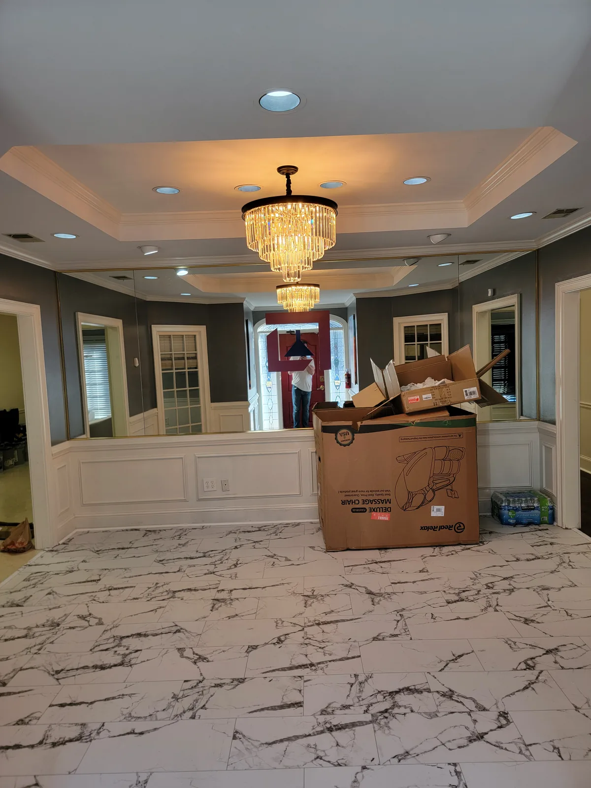 Traditional foyer chandelier installed in an Atlanta home