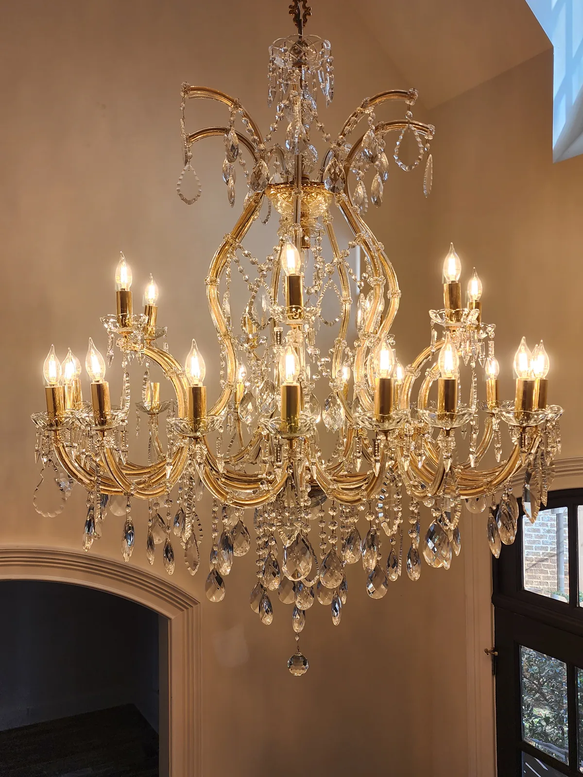 Two-story foyer chandelier installed in an Atlanta home