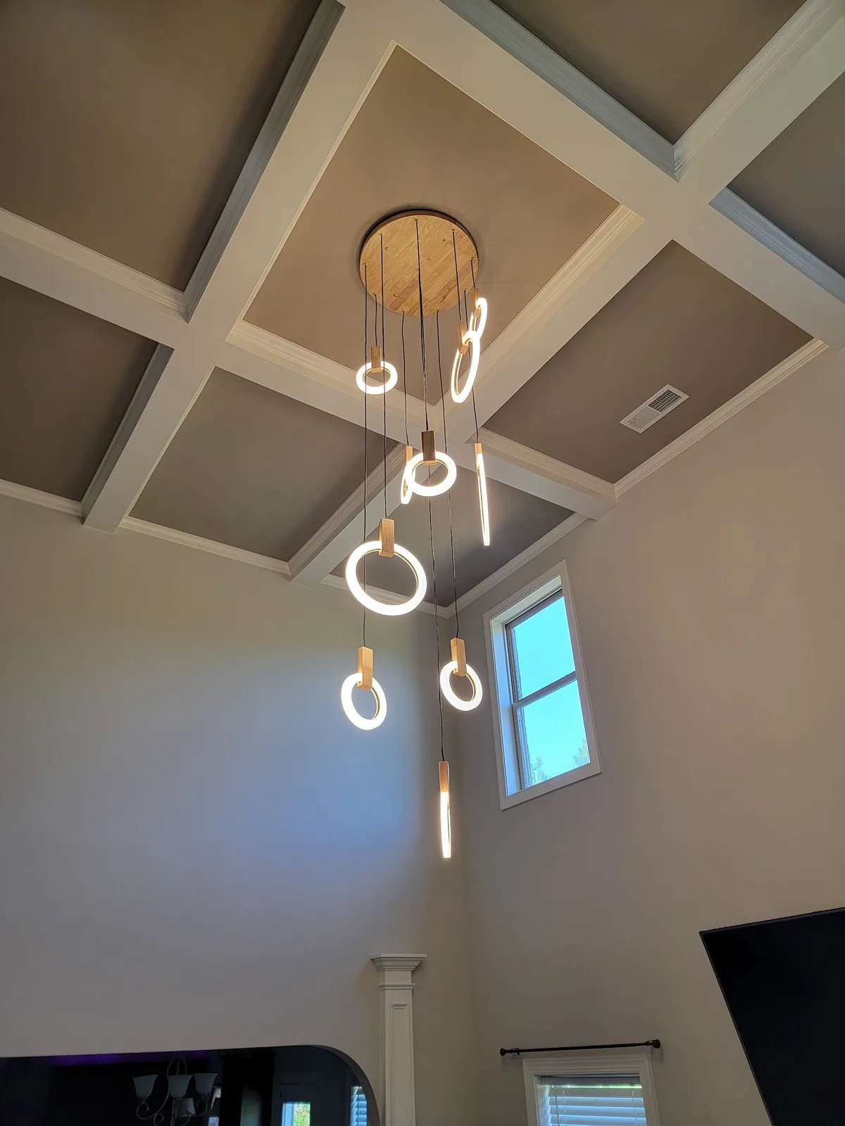 Modern crystal sphere chandelier installed in an Atlanta interior