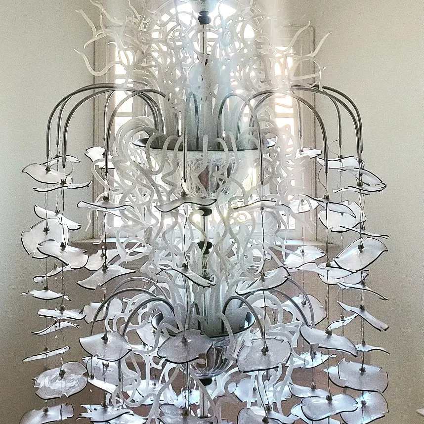 Modern round chandelier installed in an Atlanta home