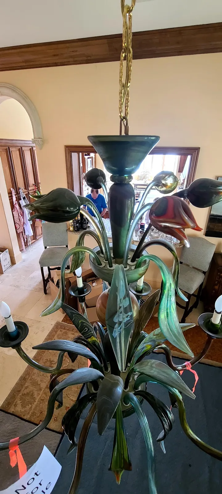 Green Murano glass chandelier installed in an Atlanta home