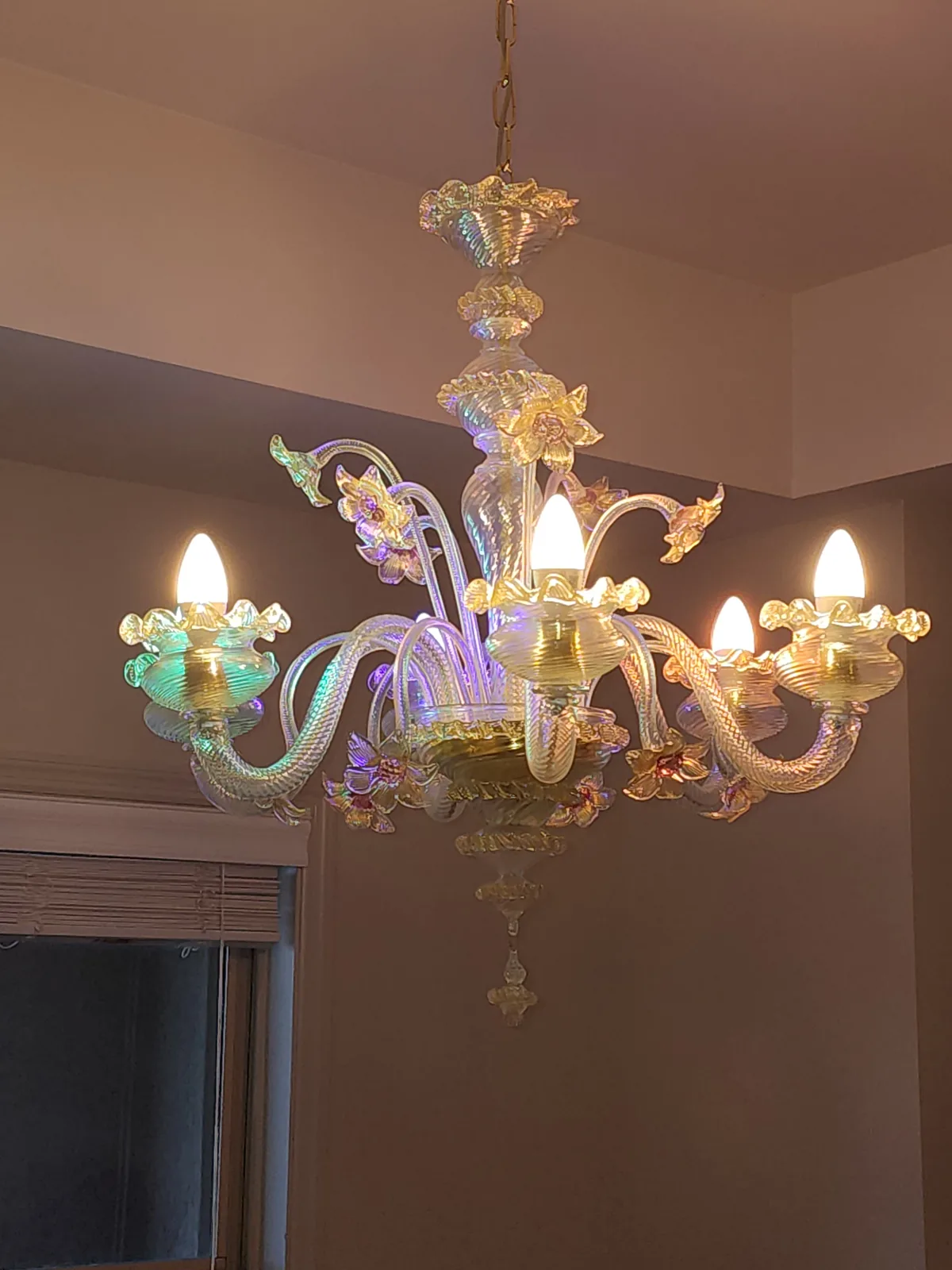 Large specialty glass chandelier installed in an Atlanta home