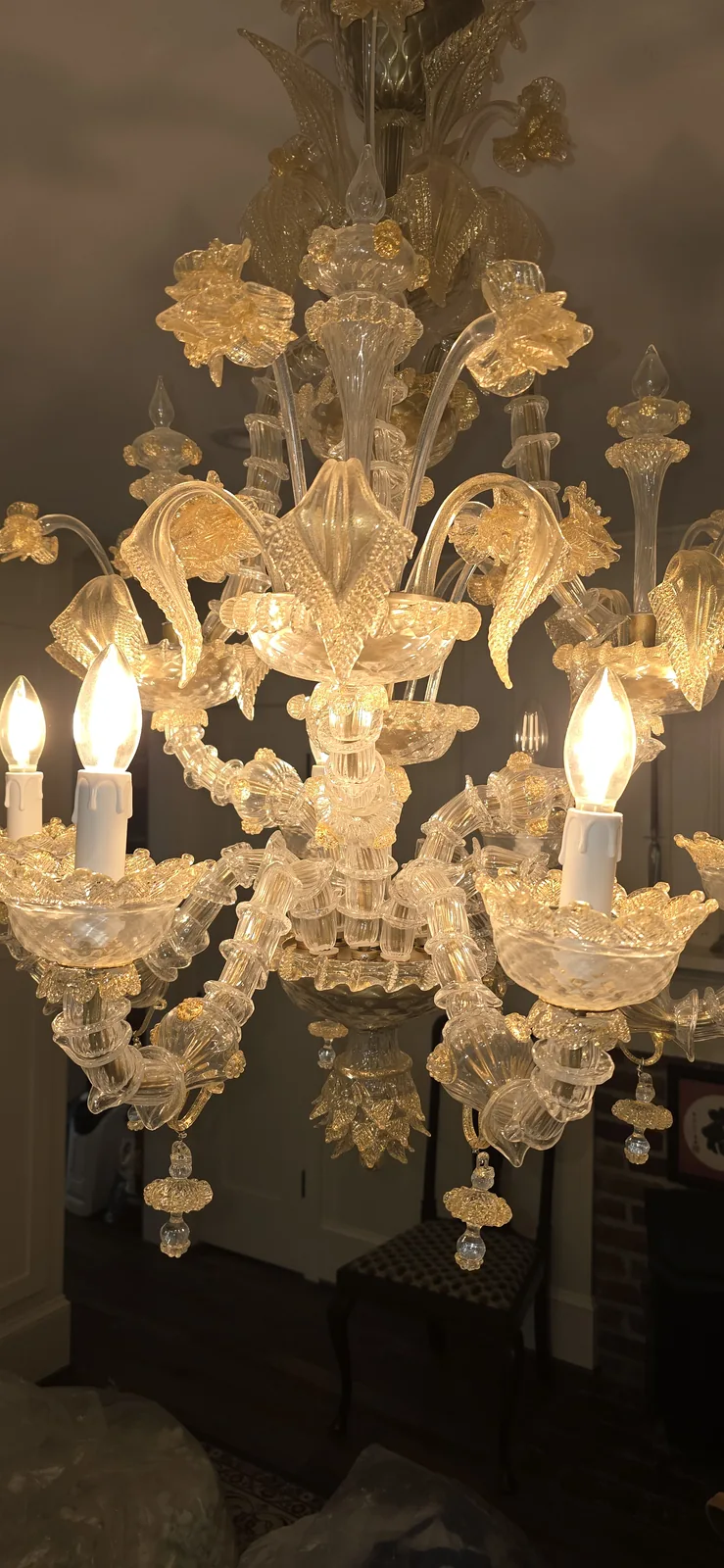 Murano glass chandelier being assembled and installed in Atlanta