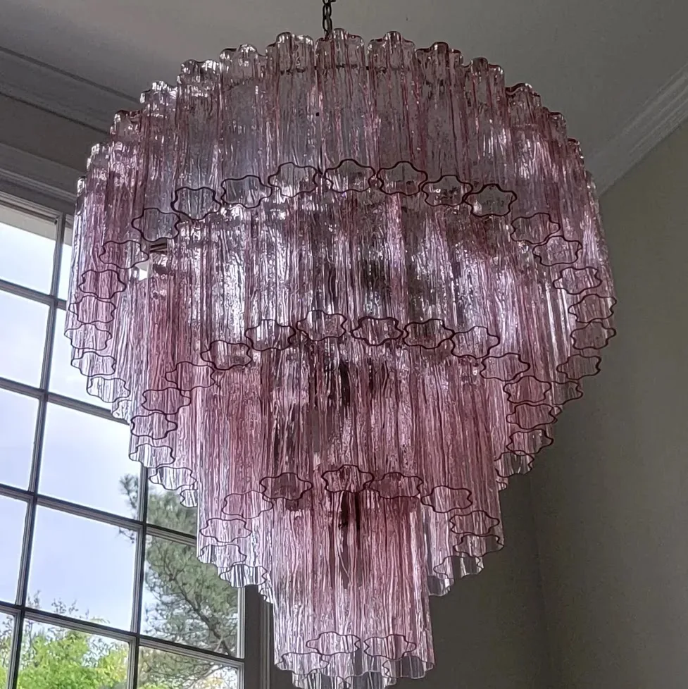 Pink Murano glass foyer chandelier installed in an Atlanta home