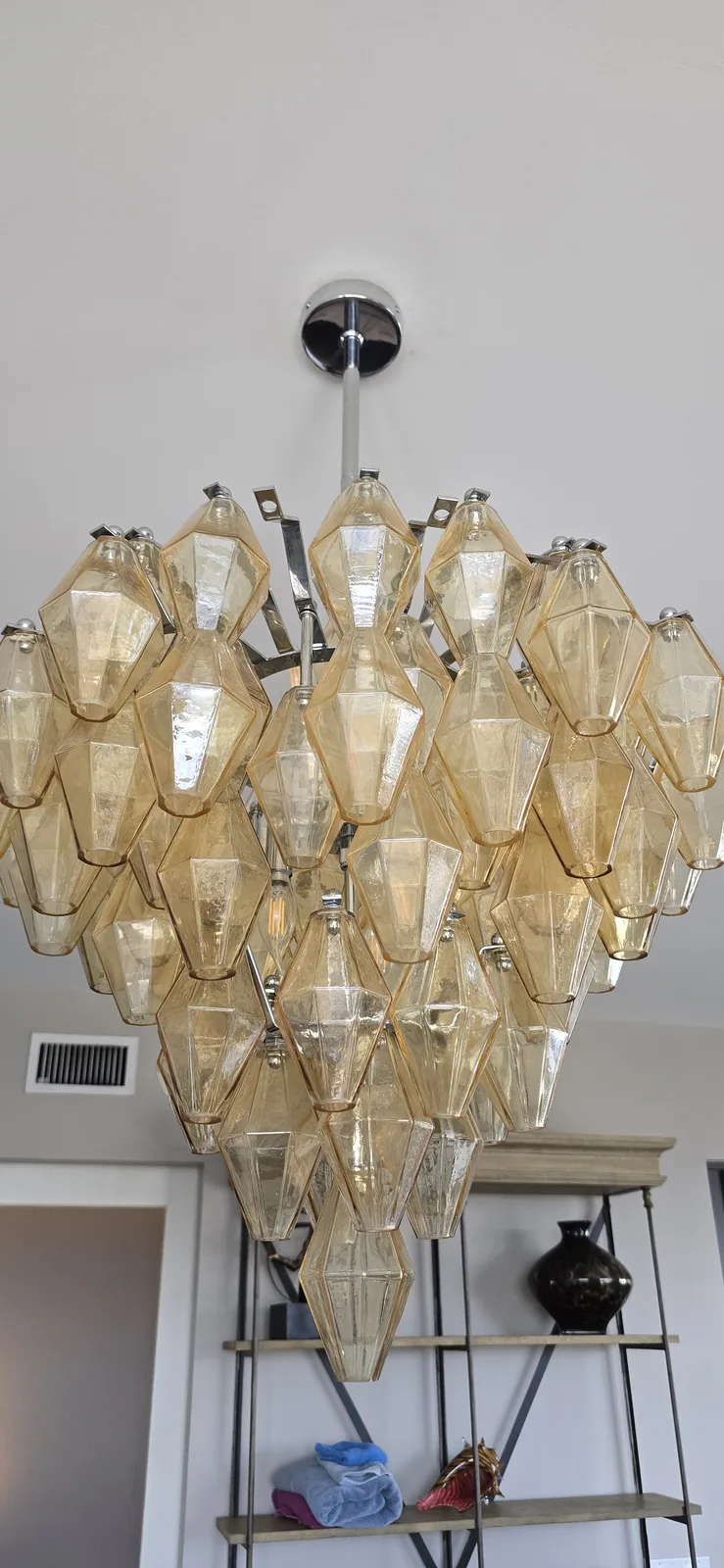 Specialty Murano glass chandelier installed in a tall Atlanta interior