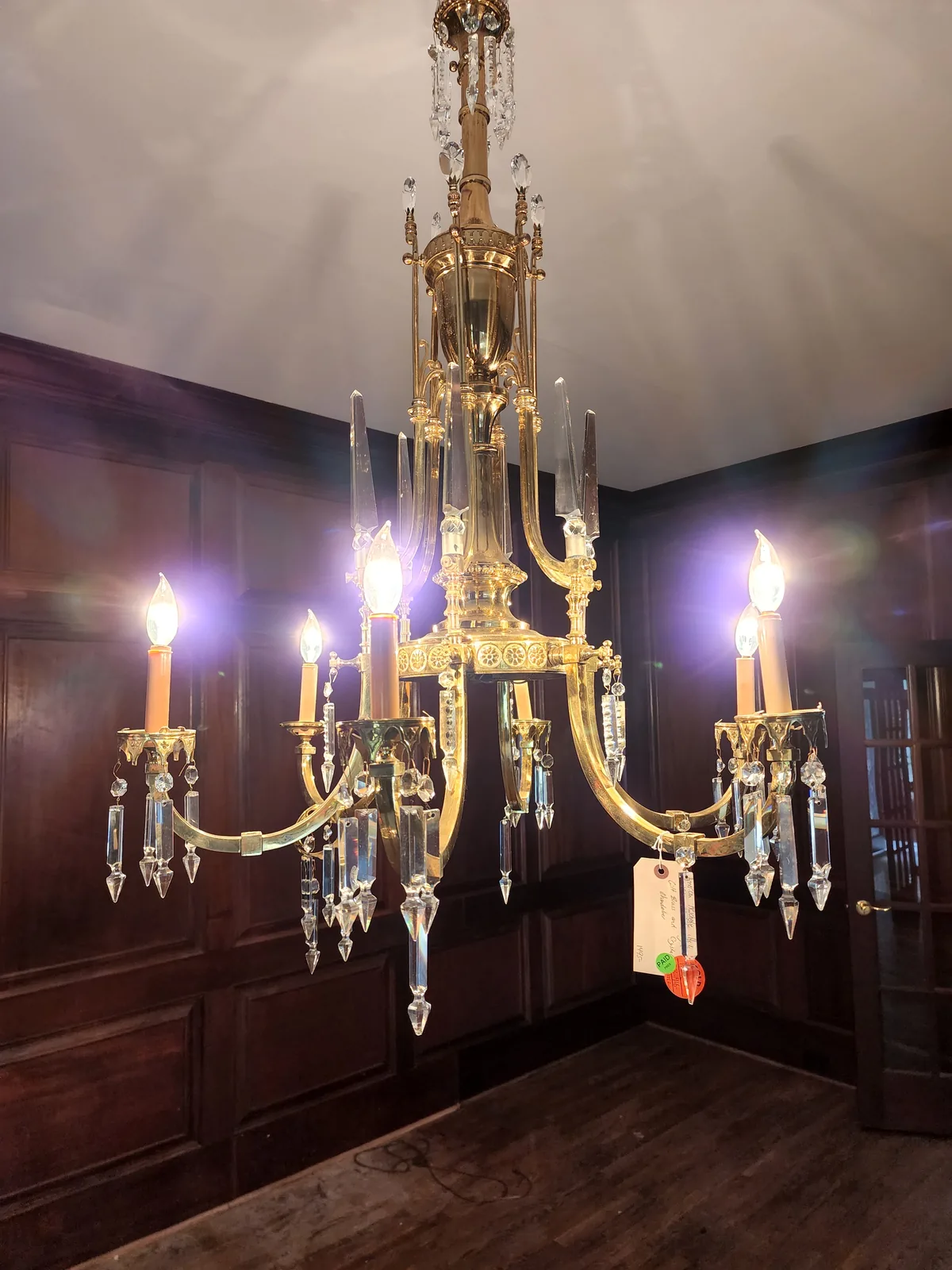 Large non-crystal chandelier installed in an Atlanta home