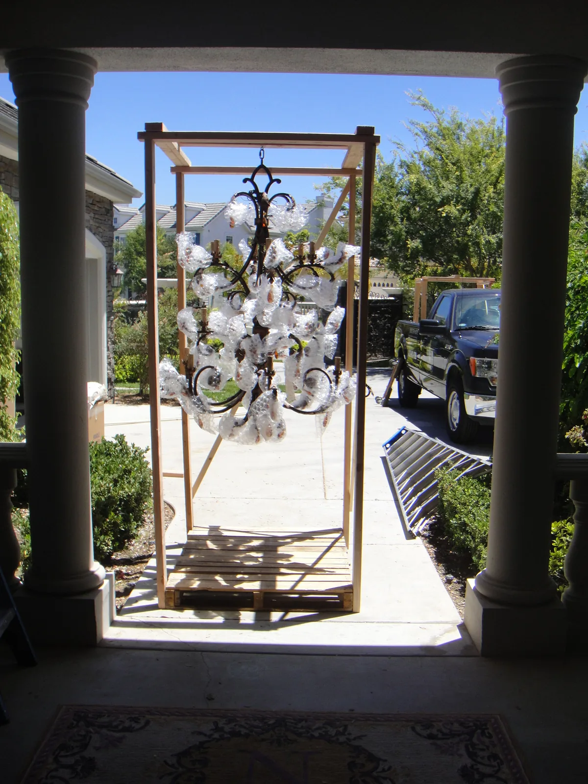 Fragile chandelier prepared for removal and storage in Atlanta