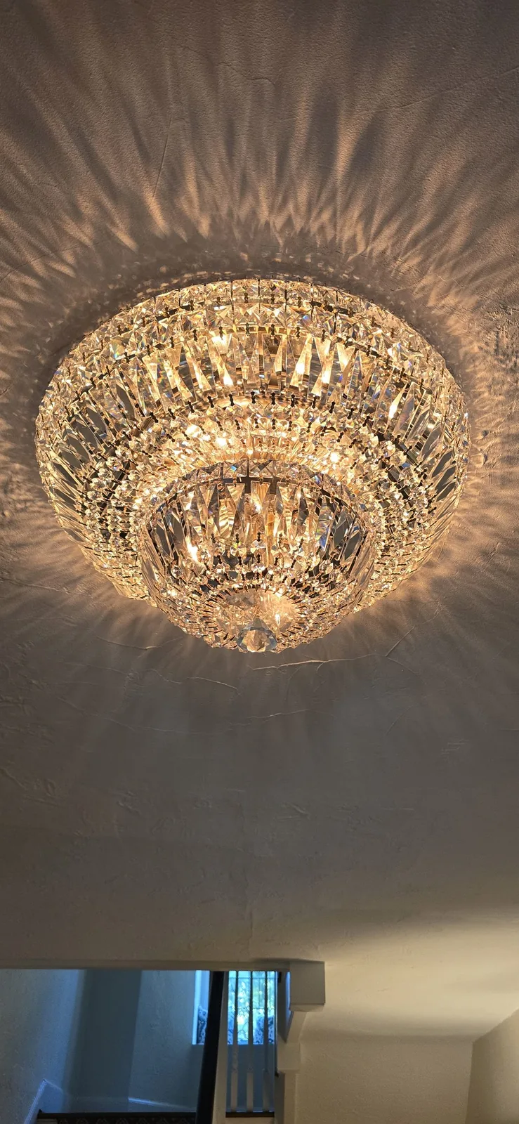 Crystal flush mount fixture after cleaning in an Atlanta home