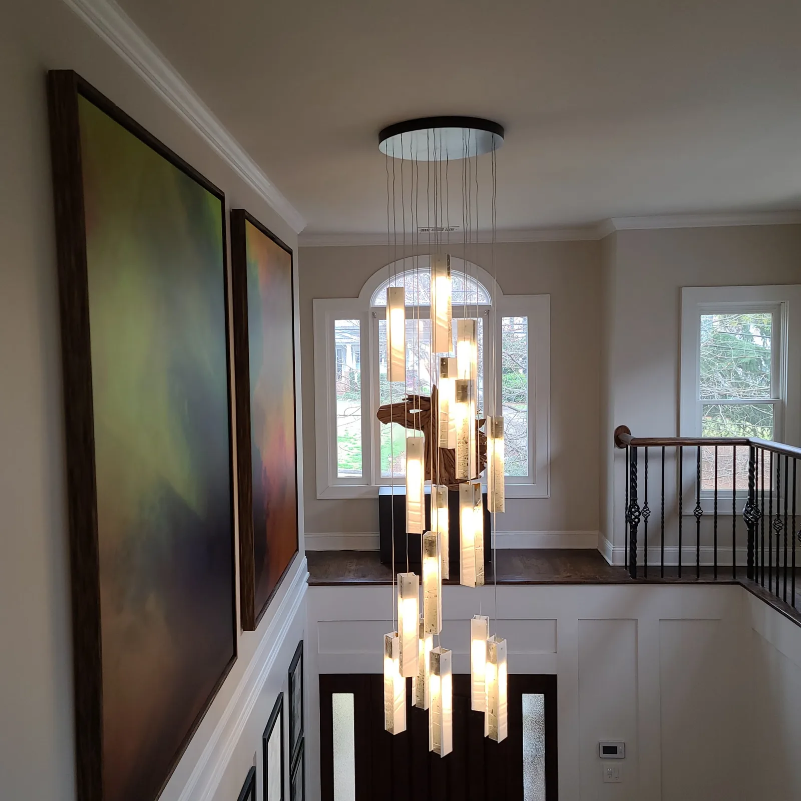 Flush mount suspension fixture installed in a room with large artwork in Atlanta