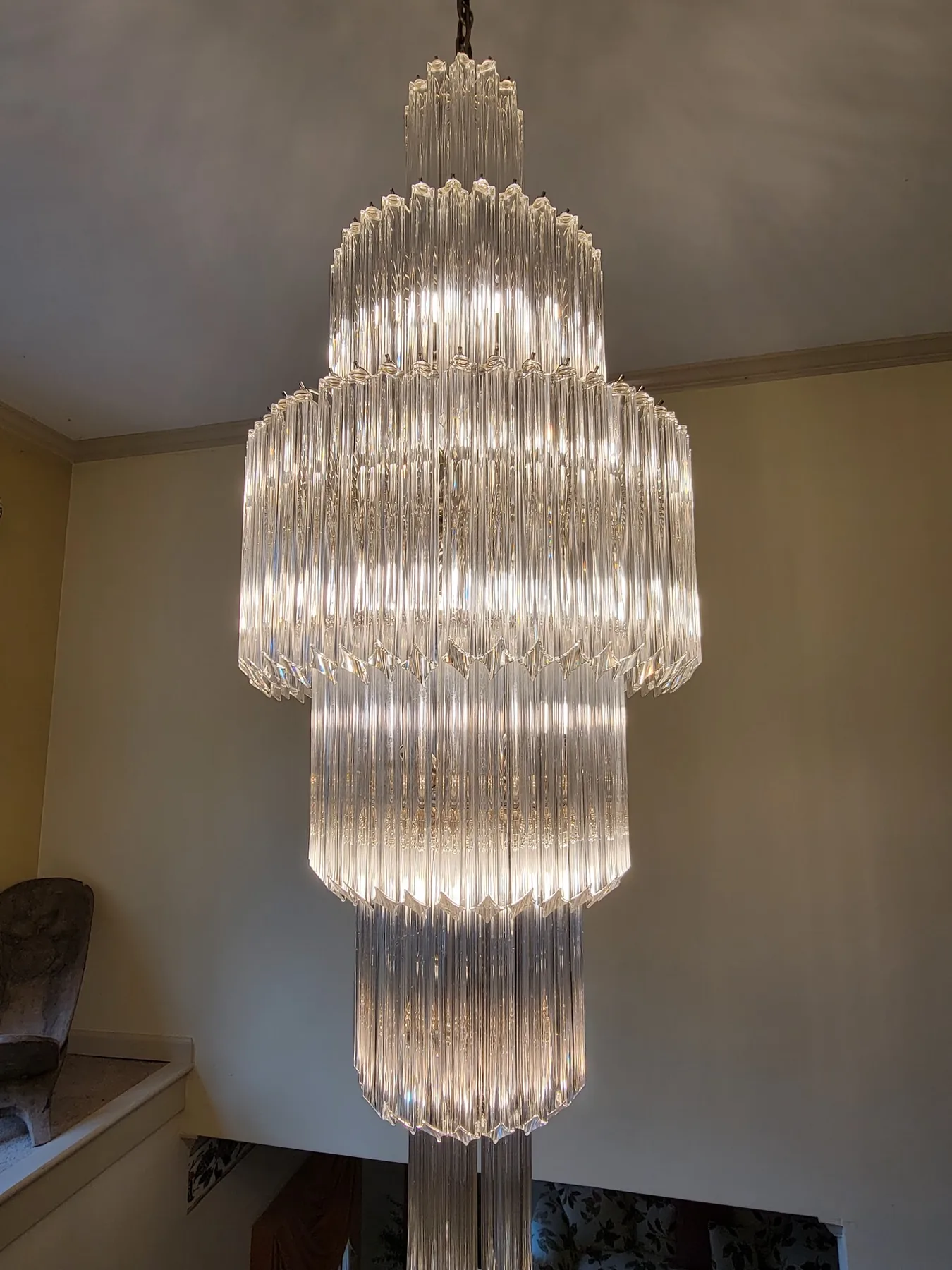 Art deco style traditional chandelier installed in an Atlanta foyer